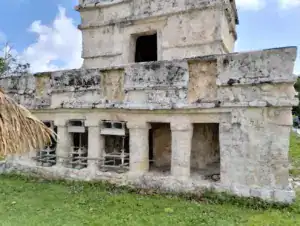 Ancient Mayan ruin at Tulum, Mexico, with stone architecture and historical significance.